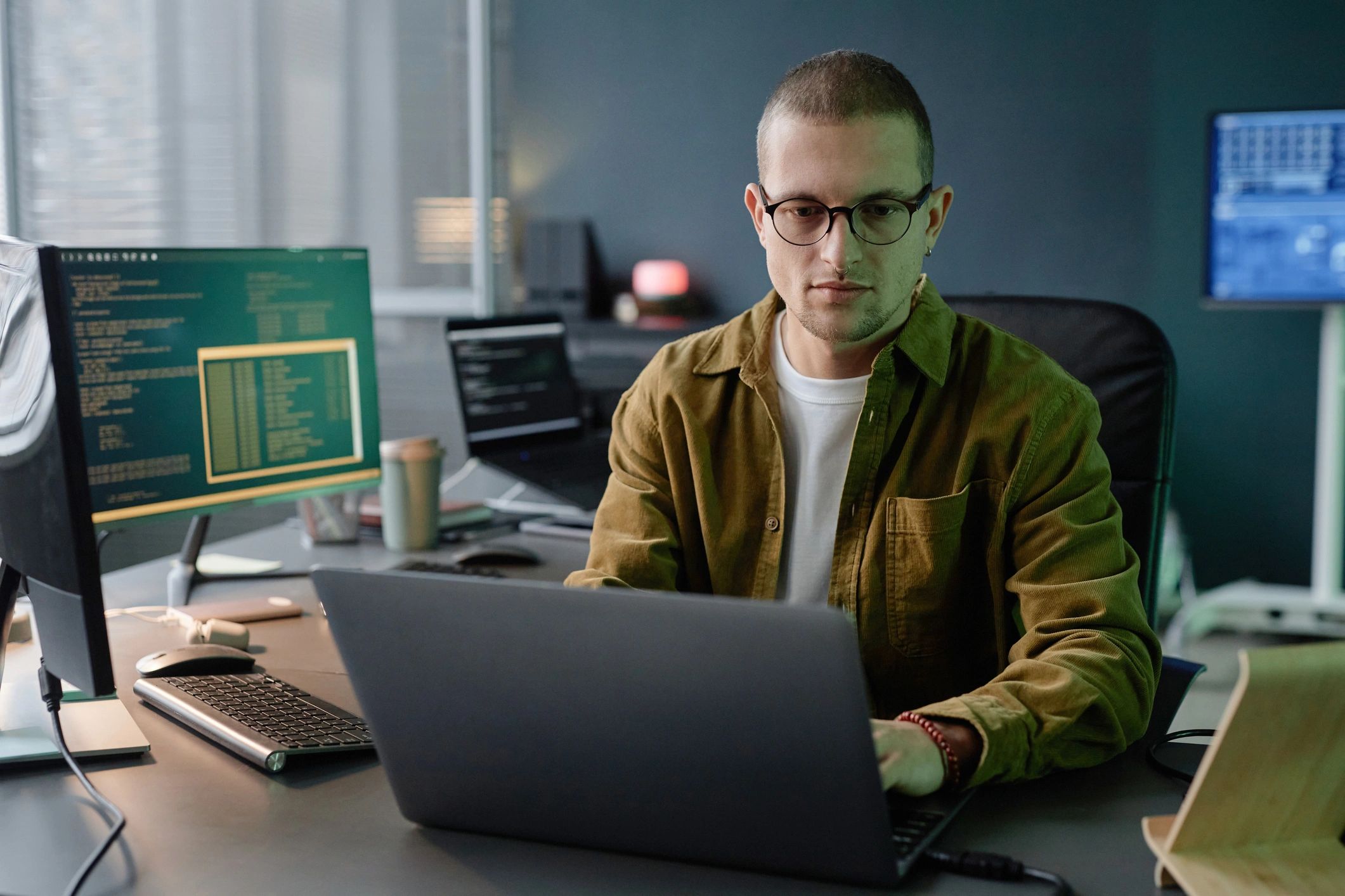 Professional consultant working on a laptop in a modern office